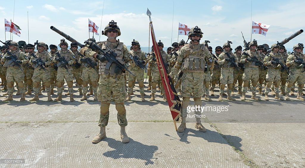Members of the Georgian Units during the opening ceremony of the Exercise Noble Partner 16, a Georgian, British and U.S. military training exercise taking place at Vaziani Training Area, Georgia, May 11-26, 2016. Exercise Noble Partner includes approximately 500 Georgian, 150 United Kingdom and 650 U.S. service members who are incorporating a full range of equipment, including U.S. M1A2 Abrams Main Battle Tanks, M2A3 Bradley Infantry Fighting Vehicles, M119 Light Towed Howitzers and several wheeled support vehicles. Alongside U.S. forces, Georgian forces will operate their T-72 Main Battle Tanks, BMP-2 Infantry Combat Vehicles and several wheeled-support vehicles. Wednesday, 11 May 2016, in Vaziani, Georgia. (Photo by Artur Widak/NurPhoto)