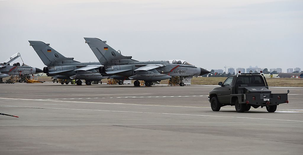 German Tornado jets are pictured on the groung at the air base in Incirlik, Turkey, on January 21, 2016. / AFP / POOL / TOBIAS SCHWARZ (Photo credit should read TOBIAS SCHWARZ/AFP/Getty Images)