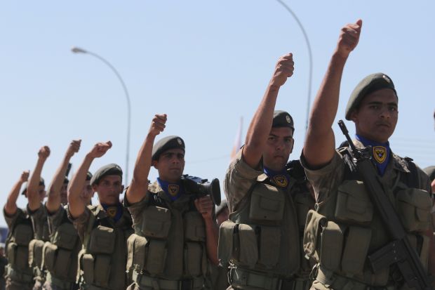 Cypriot soldiers participate in a military parade marking Cyprus' Independence Day in Nicosia, Cyprus October 1, 2016. REUTERS/Yiannis Kourtoglou