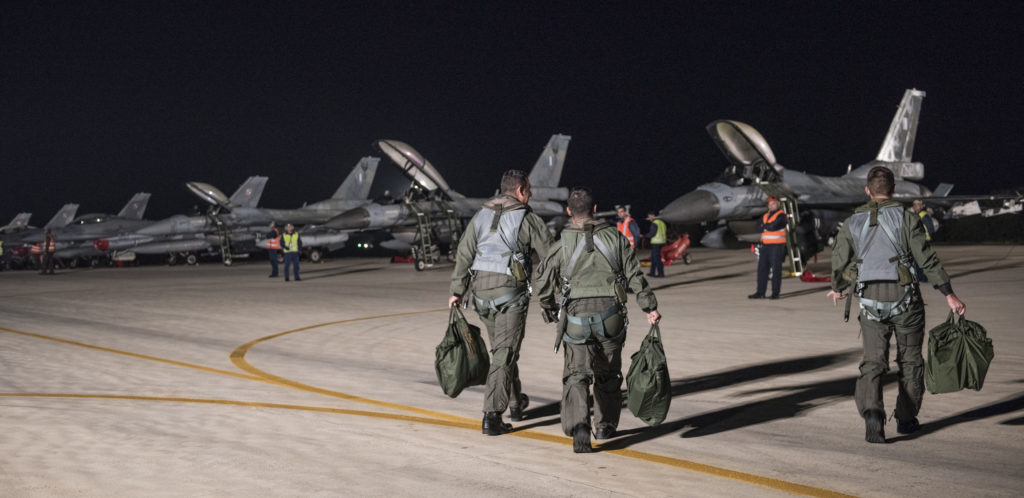 Greek Air Force F-16 pilots preparing for a night flight at Trapani Air Base, Italy on October 28, 2015 during Trident Juncture 15.