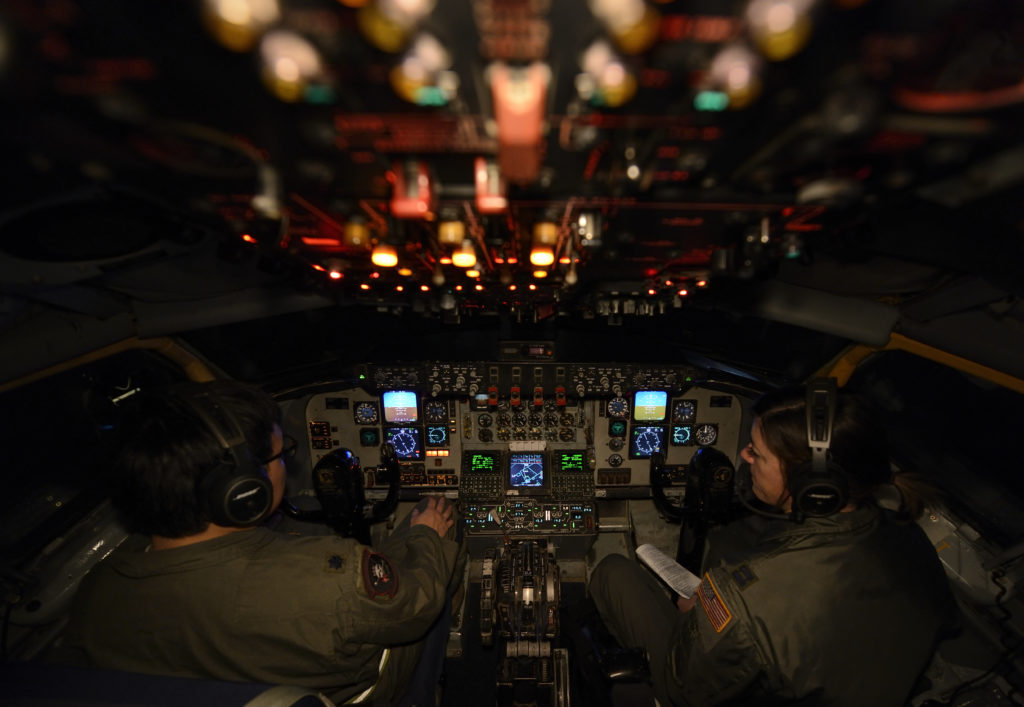 U.S. Air Force Lt. Col. Young Kim, left, and Capt. Shannon Callan, both KC-135 Stratotanker pilots assigned to the 63rd Air Refueling Squadron,927th Operations Group at MacDill Air Force Base, Fla., begin their preflight checklist during a flying training deployment at Souda Bay, Greece, Feb. 2, 2016. The KC-135 is here in support of the 480th Expeditionary Fighter Squadron’s FTD.The aircraft conducted the training as part of bilateral deployment between Greek and U.S. air forces to develop interoperability and cohesion between the partnering nations.(U.S. Air Force photo by Staff Sgt. Christopher Ruano/Released)
