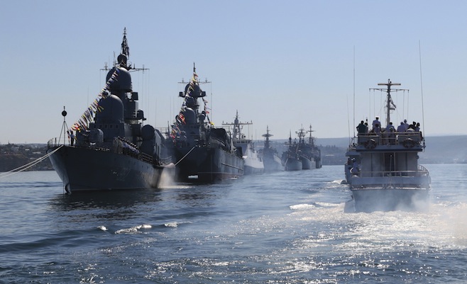 Russian warships are seen during a rehearsal for the Navy Day parade in Sevastopol, Crimea, July 24, 2015. Russia will mark Navy Day on July 26. REUTERS/Pavel Rebrov